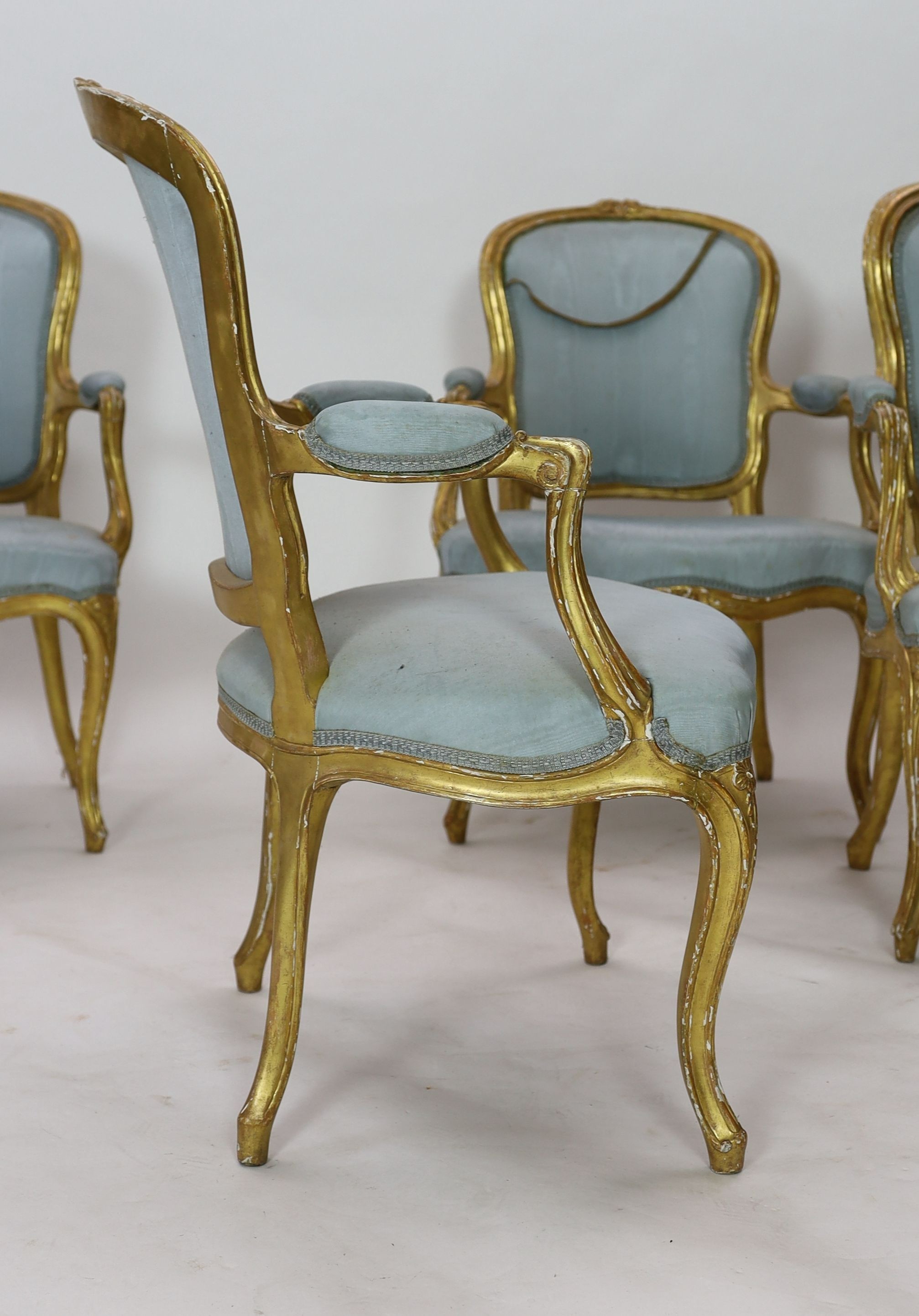 A set of four Louis XVI carved giltwood fauteuils, W.65cm D.62cm H.93cm